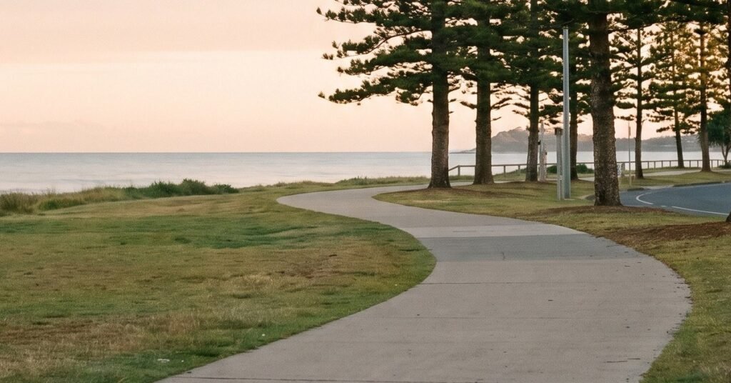 Retirement Planning Checklists 1 Coastal footpath lined with pine trees at sunset